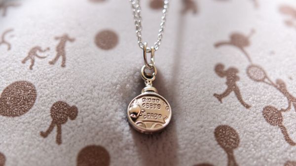 Explore personalized sports charms to honor your interests